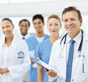 Successful team of doctors, female with the clipboard